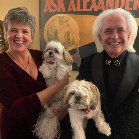 Alex and Madeline McDonald with their two rescue shih-tzus